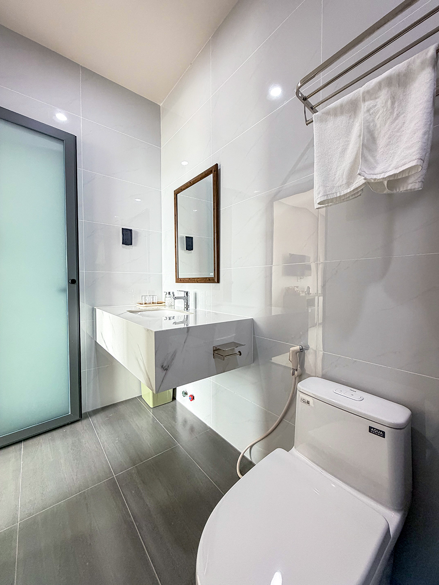 Phòng nghỉ ấm cúng tại Vela Hotel